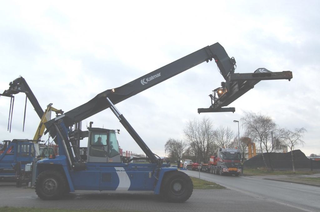 Kalmar DRF100-54S6 Leercontainer Reachstacker www.hinrichs-forklifts.com