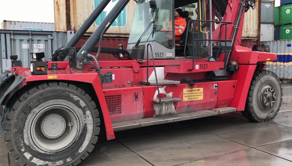 Kalmar DRF100-54-S6 Leercontainer Reachstacker www.hinrichs-forklifts.com