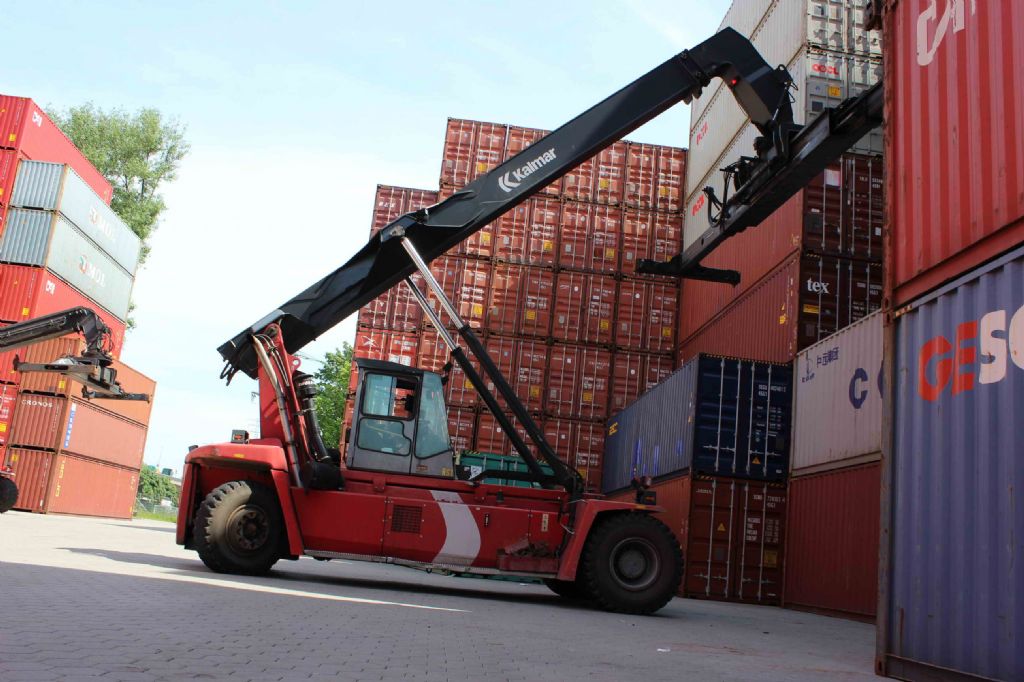 Kalmar DRF100-54-S6 Leercontainer Reachstacker www.hinrichs-forklifts.com